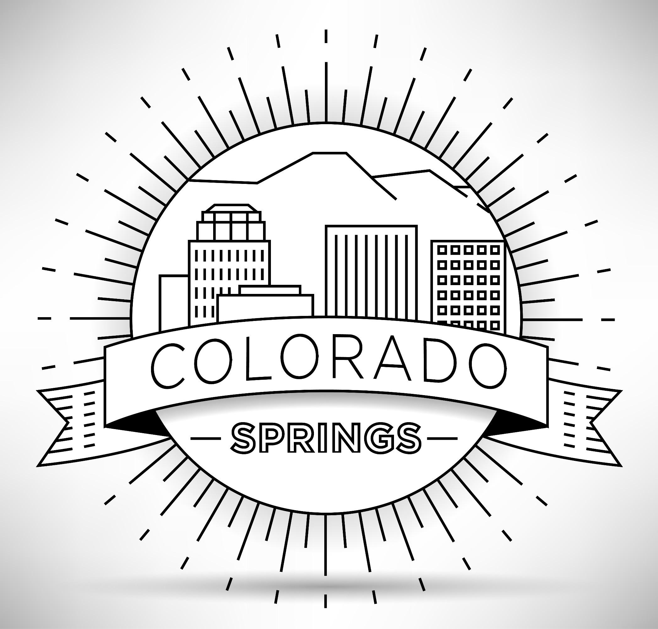 Circular depiction of the Colorado Springs, Colorado skyline.